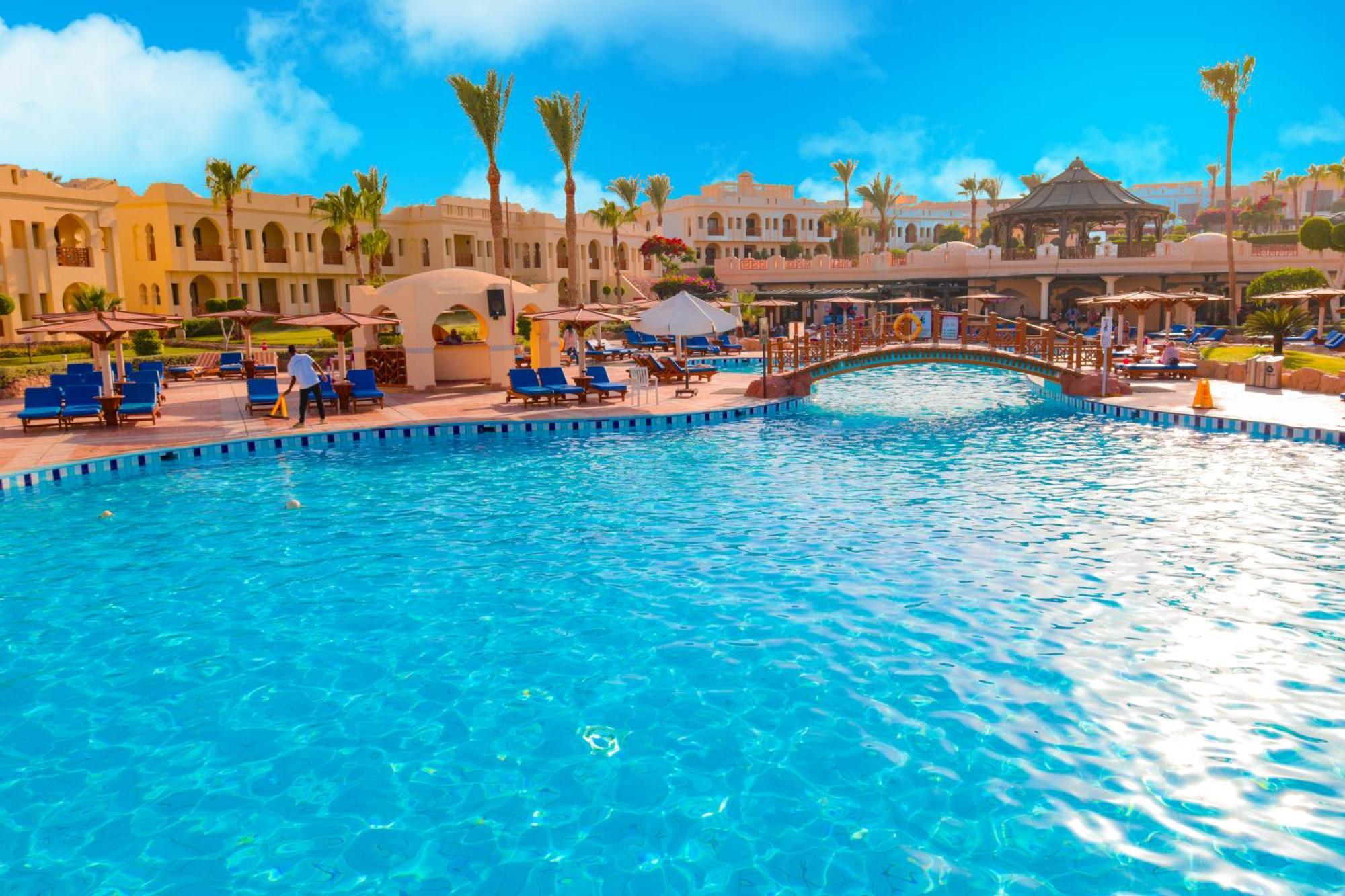 Charmillion Club Resort Sharm el-Sheikh Exterior photo The pool at the Hilton Sharm El Sheikh
